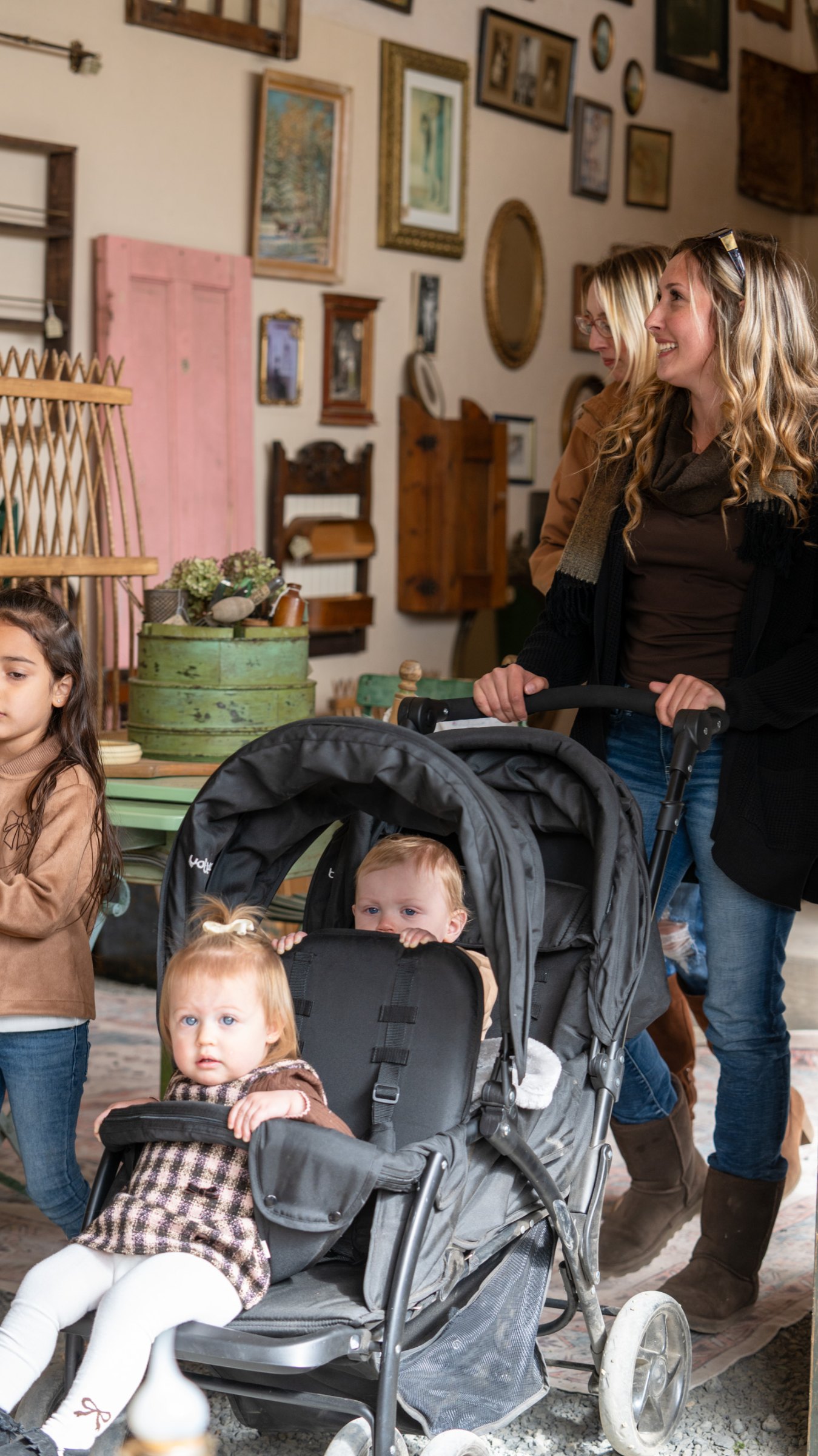 Visitors with a stroller browsing the greenhouse