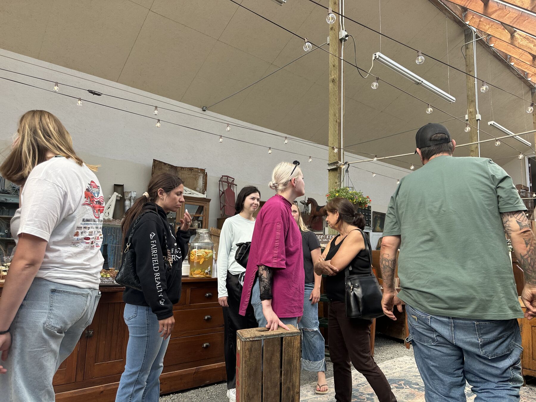 Friends enjoying a greenhouse gathering