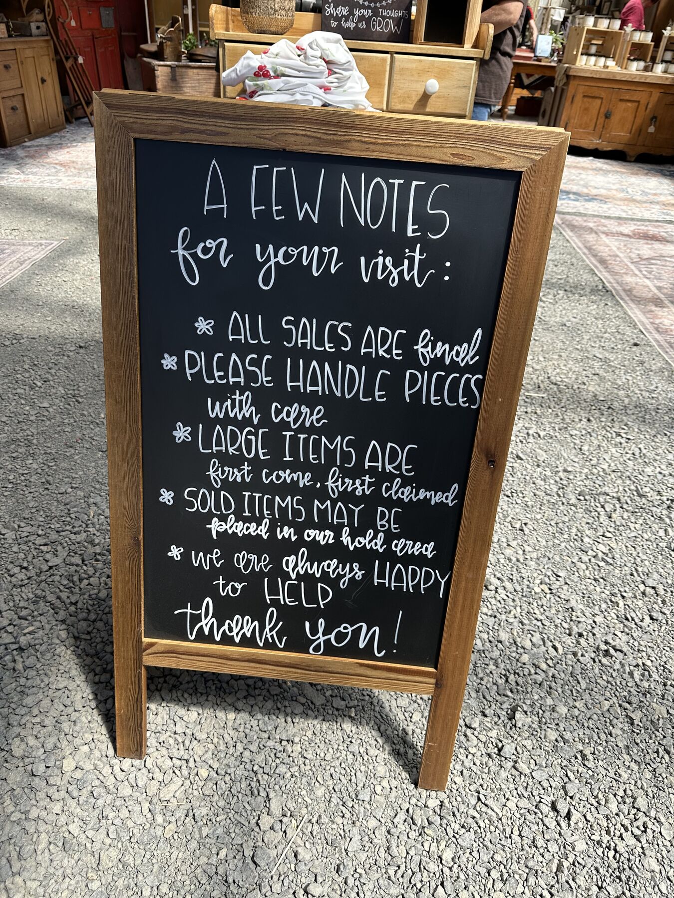 A chalkboard with notes for visiting Roots and Relics