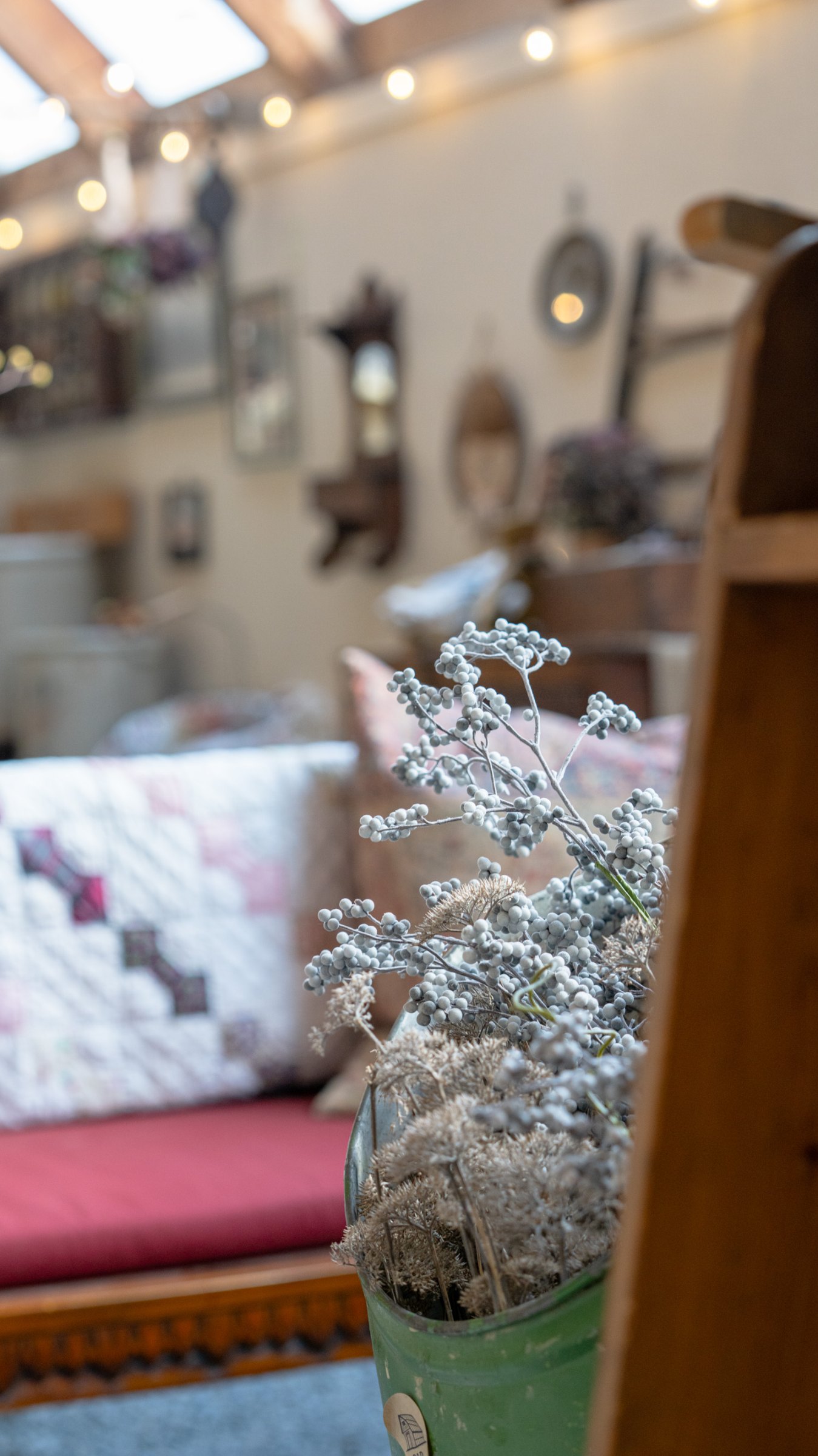 Dried flowers and antique furnishings in the greenhouse